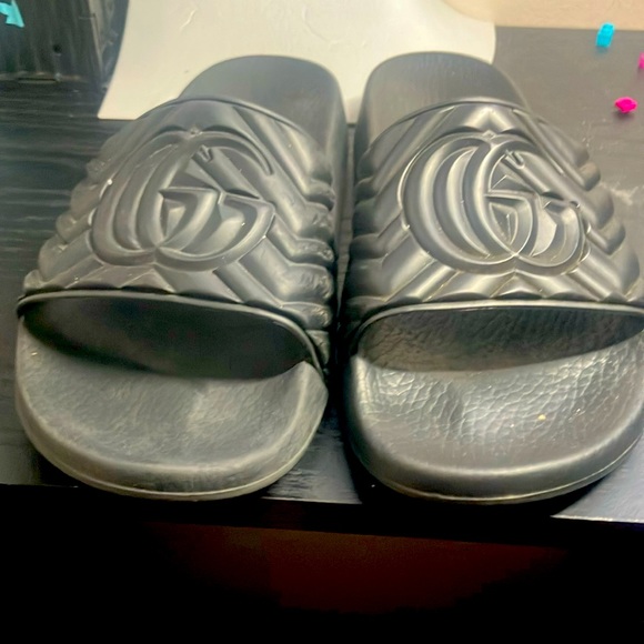 I am sellingg these Gucci slides there are black and not in best condition